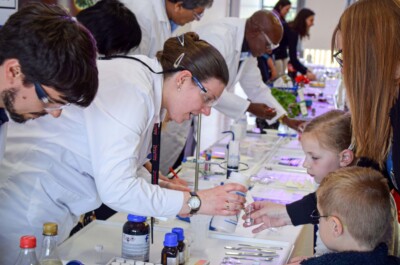 UK,ROTHLEY - 29 OCTOBER 2015: Laboratory chemists tak a day out of the lab to teach children about chemistry as part of the UK STEM, science, technology,engineering and mathematics education program.