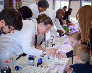 UK,ROTHLEY - 29 OCTOBER 2015: Laboratory chemists tak a day out of the lab to teach children about chemistry as part of the UK STEM, science, technology,engineering and mathematics education program.