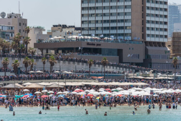 Israel, Tel Aviv-Yafo - 19 April 2018: Crowd watching the elebration of the 70th independence day of Israel - Yom haatzmaout - airshow of of the Israeli air force - aerobatics (Photo by Michael Jacobs/Art in All of Us/Corbis via Getty Images)