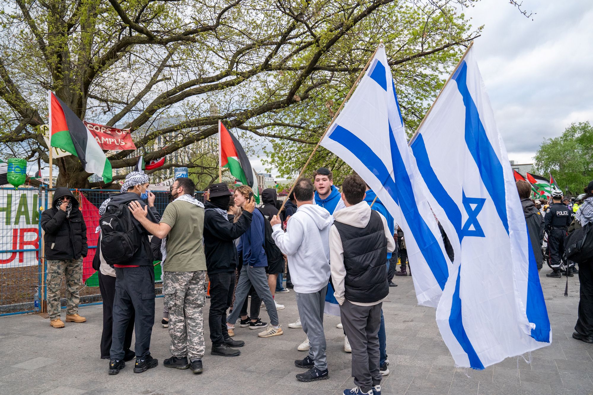 Jewish students have heated exchange with pro-Palestinian protesters outside the student encampment occupying King's College Circle at the University of Toronto