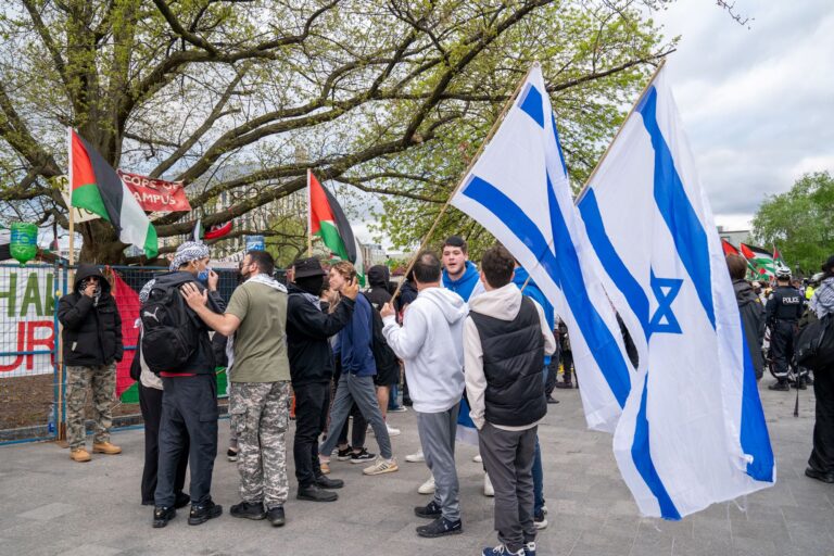 Jewish students have heated exchange with pro-Palestinian protesters outside the student encampment occupying King's College Circle at the University of Toronto.